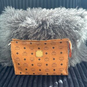 MCM Tangerine Monogram Clutch